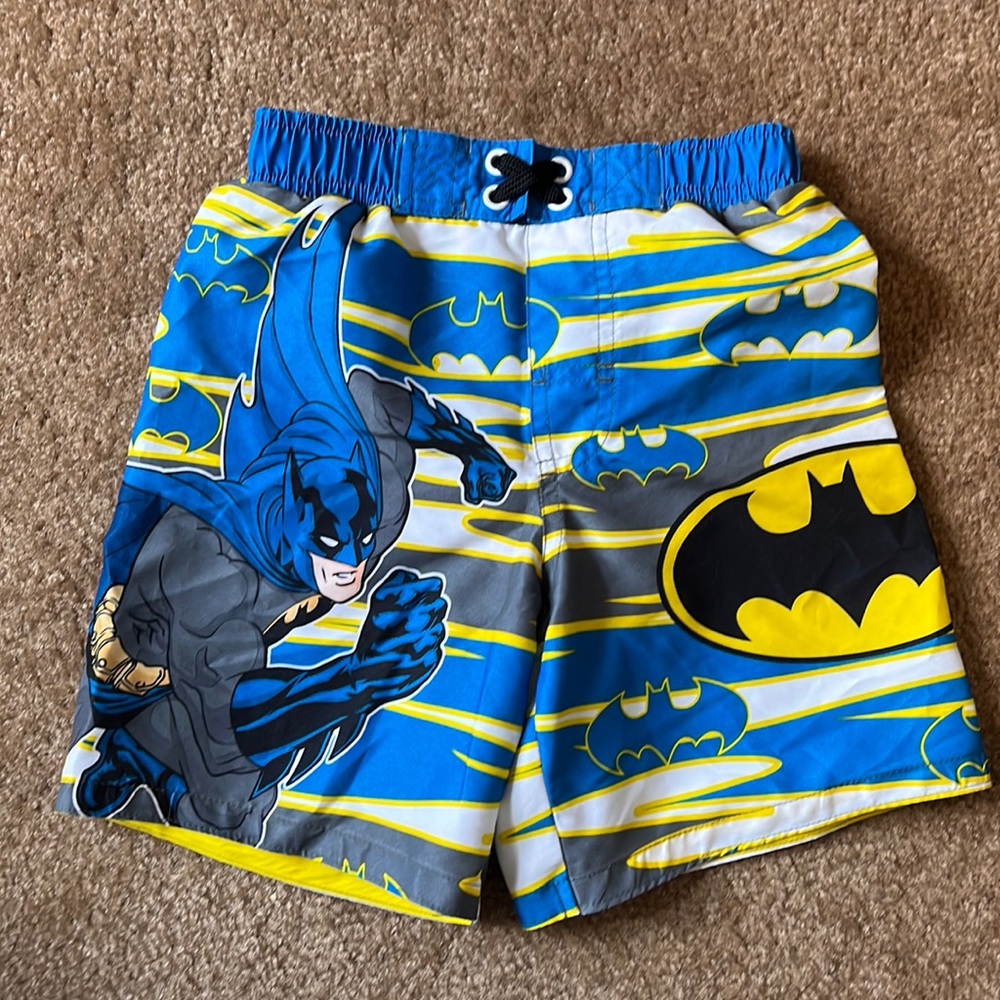 3/$12 Batman swim trunks